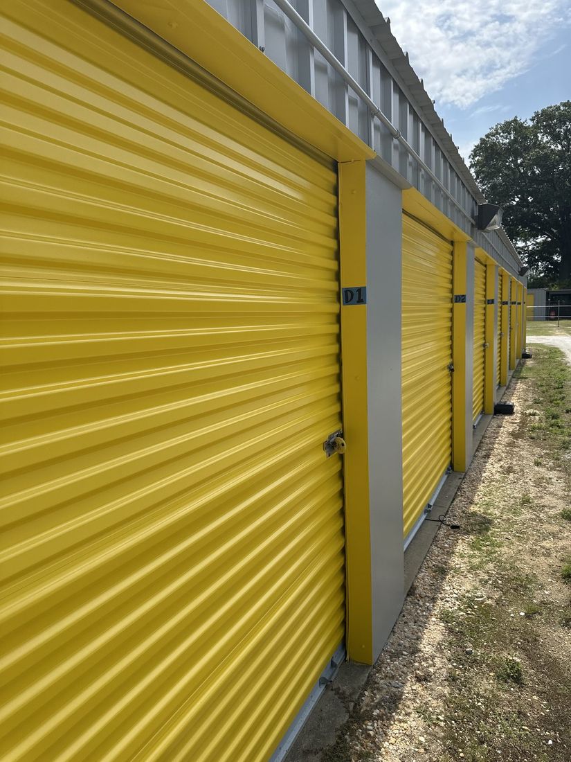 Yellow roll-up door at Self Storage Goldsboro NC-111