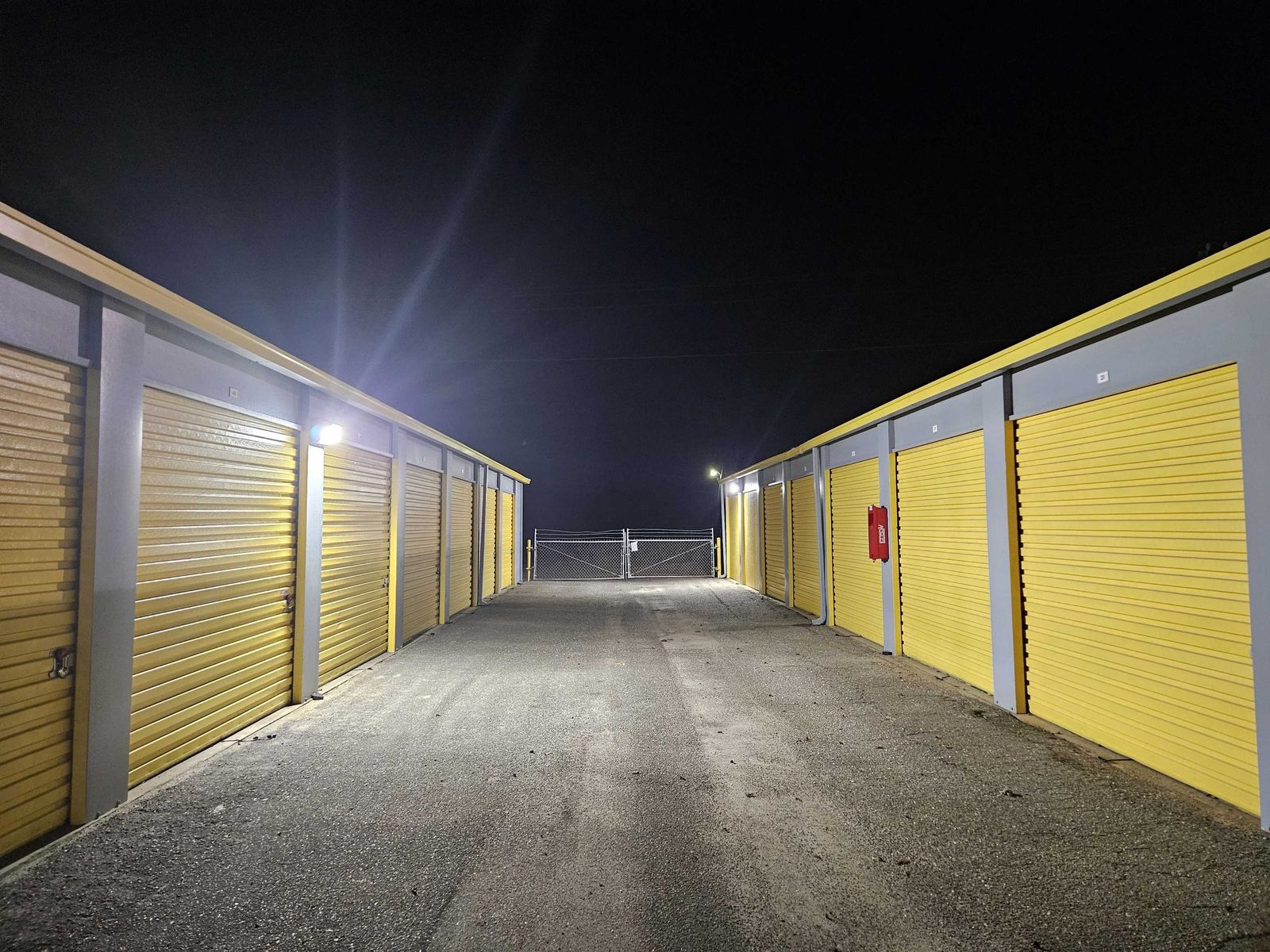 Self Storage Goldsboro US-117 drive aisle lit at night